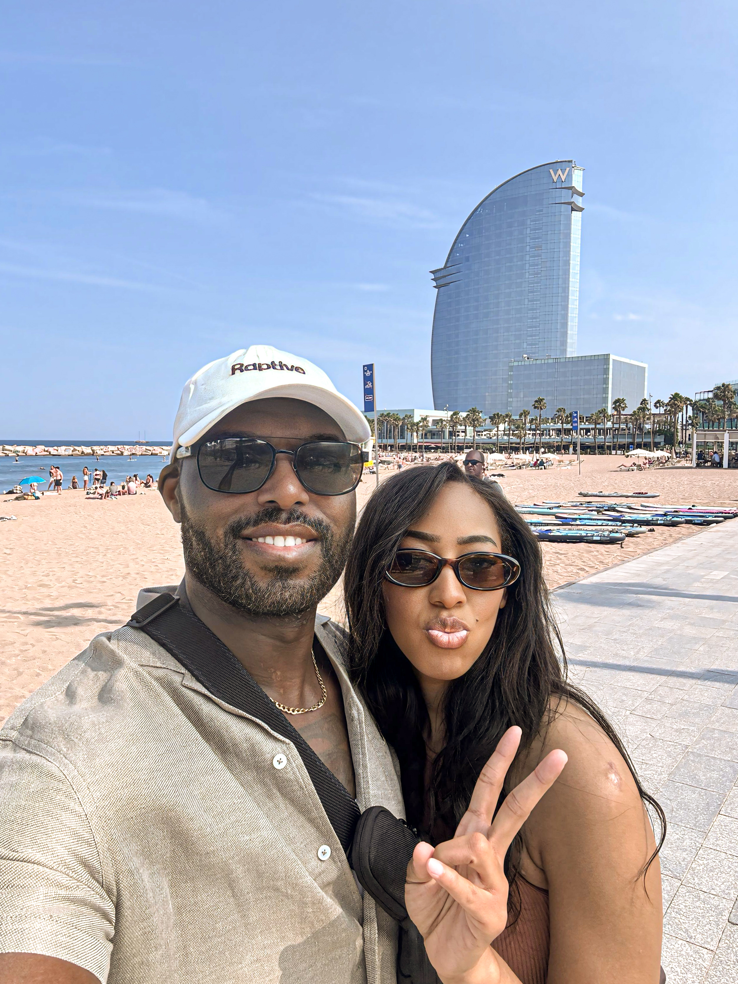 TrvlBē founder sharing a travel moment by the beach